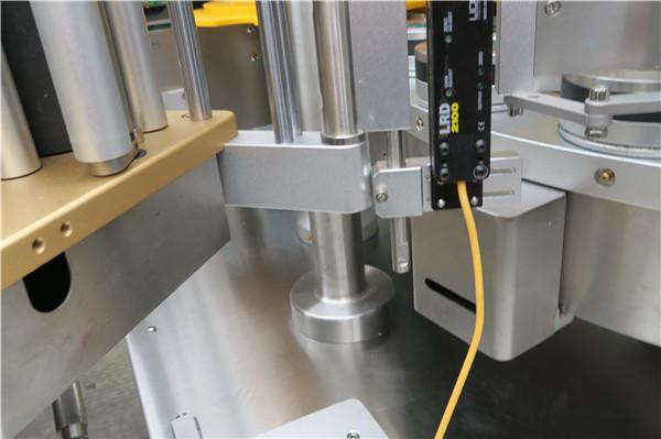 ເຄື່ອງຕິດສະຕິກເກີ້ແບບ ໝູນ ວຽນຄວາມໄວສູງດ້ວຍຕົວເລືອກສາຍແອວເຄື່ອງເຕີມ