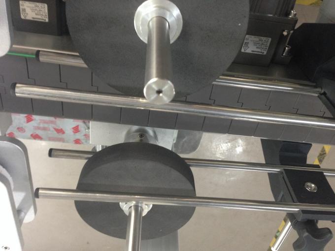 ຜູ້ສະ ໝັກ ປ້າຍຕິດຂວດຂວດ, ເຄື່ອງຈັກຕິດກາບ ສຳ ລັບຕິດປ້າຍ